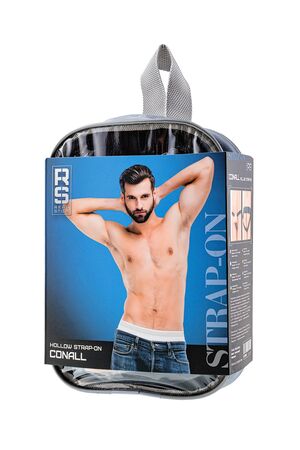 Телесный фаллопротез на черных ремнях Conall - 15 см.